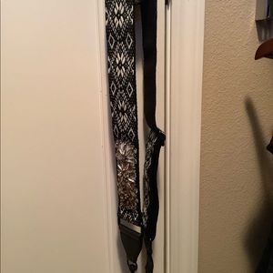 Rebecca mink off guitar bag strap